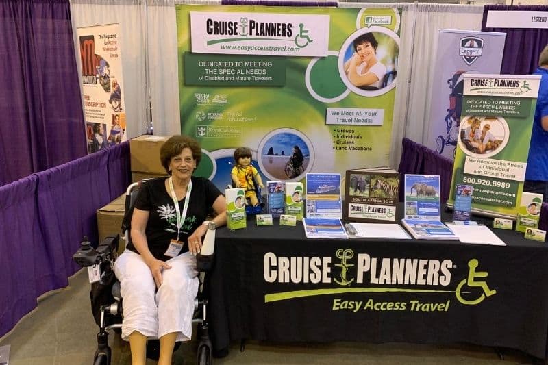 Travel Agent Debra Kerper works her Cruise Planners Business at a Trade Show