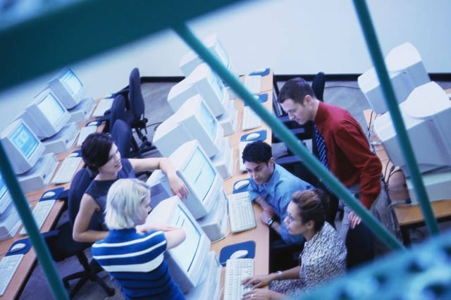 Workers Using Computers FREE TRAVEL UNIVERSITY COURSES