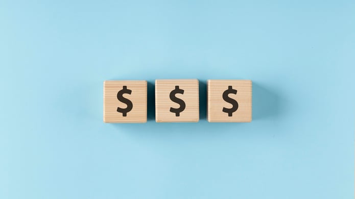 wooden block dollar signs