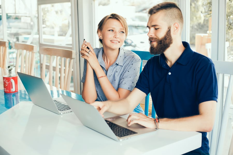 young travel agent couple working